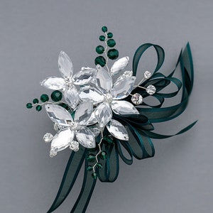 deep emerald green corsage with silver flowers