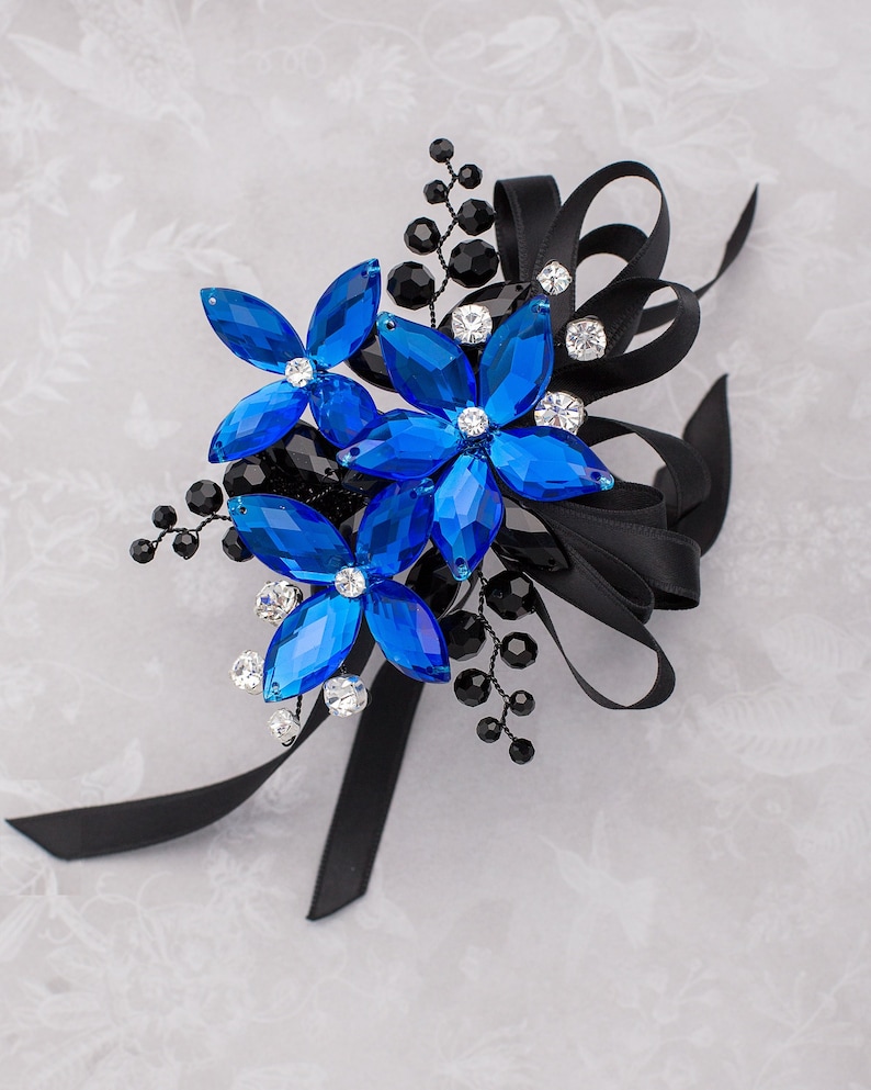 Royal blue and black corsage by Ky Kampfeld for prom, weddings, homecoming, and dances