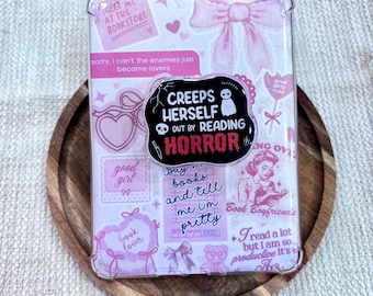 Si spaventa leggendo un libro horror su Kindle/Phone Grip