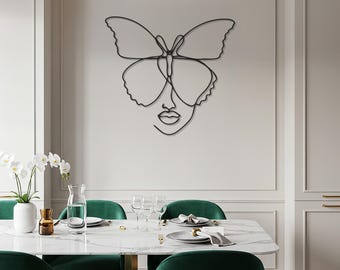 Arte de pared metálico con cara de mariposa: silueta femenina abstracta moderna para dormitorio o sala de estar. Decoración minimalista de pared de acero negro.