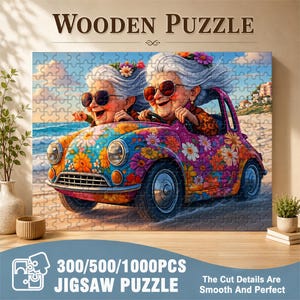 May include: A wooden jigsaw puzzle featuring a colorful illustration of two elderly women in sunglasses driving a flower-covered car. The puzzle includes the text "WOODEN PUZZLE" and "300/500/1000PCS JIGSAW PUZZLE". The cut details are smooth and perfect.