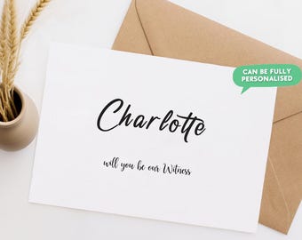 May include: A white rectangular card with black text that reads Charlotte and will you be our Witness, accompanied by a brown envelope and a green speech bubble graphic stating CAN BE FULLY PERSONALISED, positioned next to dried wheat stalks.
