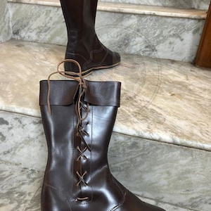 Black leather tall medieval boots for Viking, pirate, Renaissance costumes.