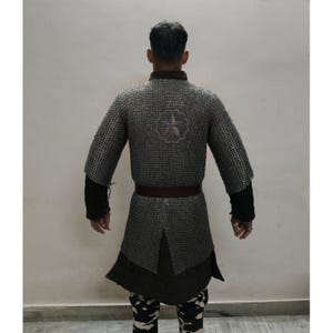 Back view of handmade medieval chainmail hauberk in mild steel with flat riveted 9mm rings, authentic European armor design