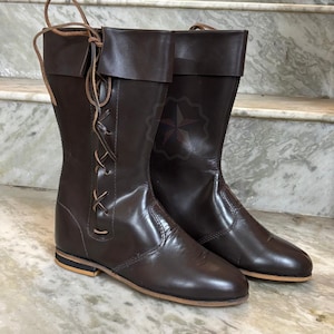 Rustic brown leather cosplay boots for LARP and historical reenactment events.