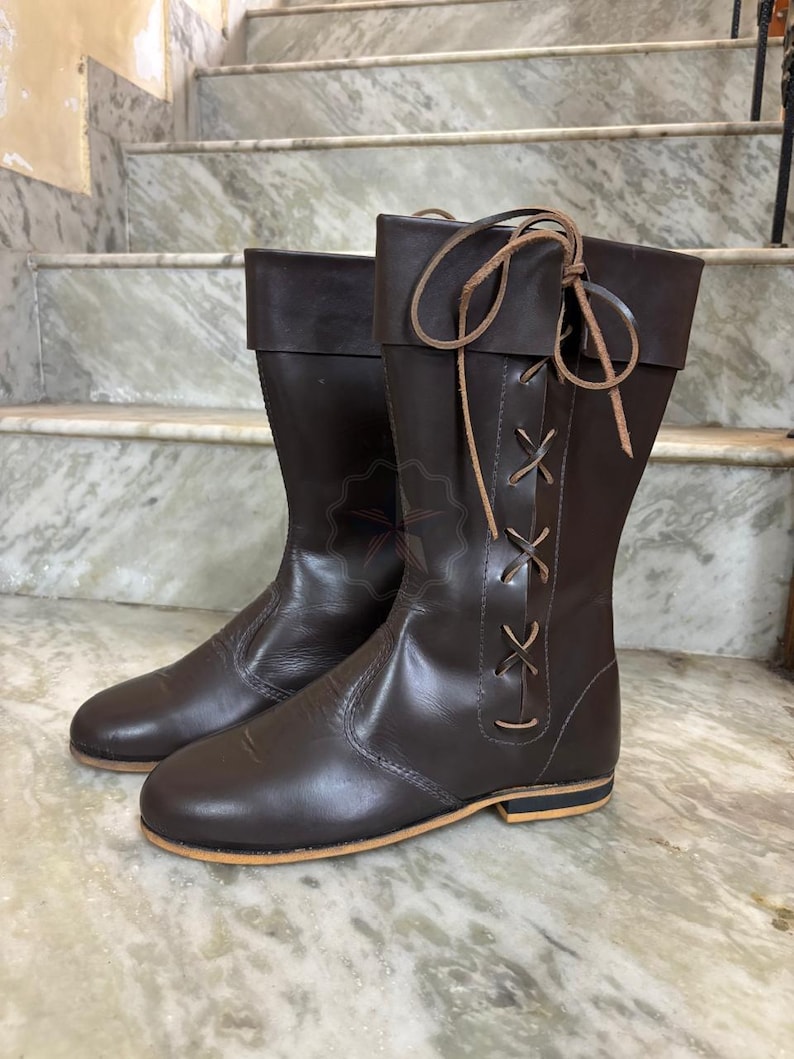Tall handmade boots styled with medieval costume outfit for festival wear.
