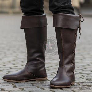 Profile view of calf-high leather LARP boots showing durable stitching and flexible sole for outdoor terrain.