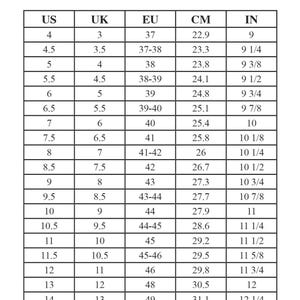 May include: A black and white shoe size guide chart featuring columns for US, UK, EU, CM, and IN measurements. The table lists numerical values ranging from US size 4 to 15, providing corresponding international size conversions for footwear.