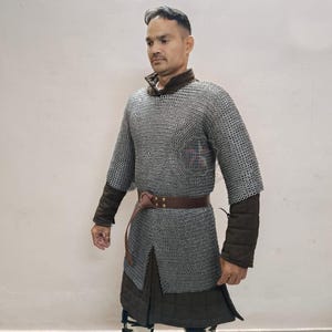 Full-length medieval chainmail hauberk laid flat, handmade 9mm flat riveted mild steel armor