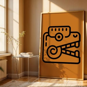 May include: A rectangular framed wall art piece featuring a solid ochre background with a bold black graphic illustration of a stylized creature head with a prominent spiral eye, rectangular snout, and open jaw with visible teeth.