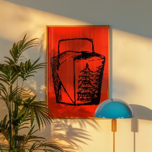 May include: A rectangular wall art print featuring a vibrant red background with a bold black ink sketch of a classic takeout container. The illustration on the container depicts a multi-tiered pagoda structure, rendered in a loose, expressive style.