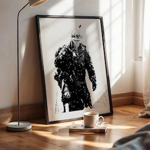 May include: A framed black and white art print featuring a high-contrast illustration of a soldier in uniform, wearing a helmet and carrying gear. The graphic style uses heavy black ink textures against a white background to depict the figure.