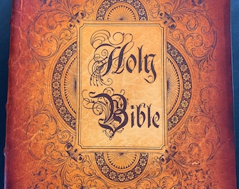 May include: A brown leather-bound Holy Bible with ornate gold detailing and the name "Neese" embossed on a ribbon banner.