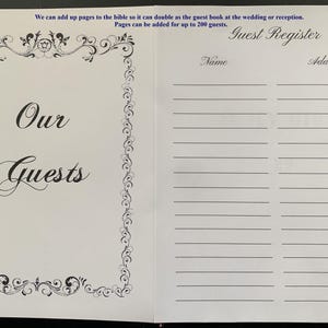 May include: A white guest book with a decorative border and the text "Our Guests" on the front cover. The back cover has a guest register section with columns for name and address.