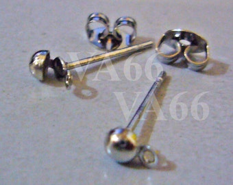 May include: Three silver earring backs, two with posts and a ball at the end, and one with a butterfly clasp.