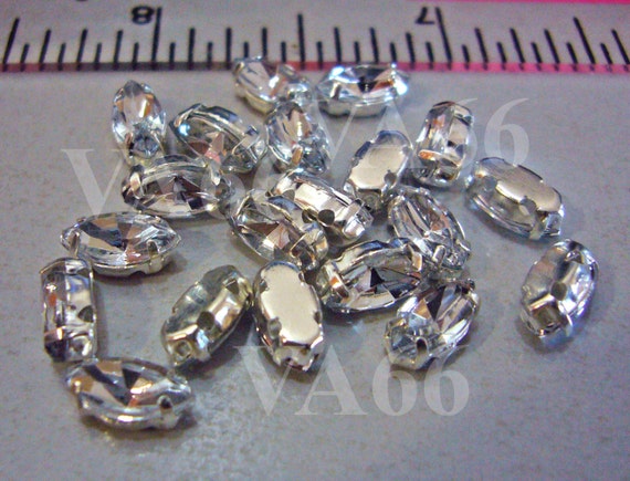 thumbnail interactive-video image 1 of Glass Navette Sew-On Rhinestones 5x10mm – White AB Crystal, 1-Piece 1 of 4