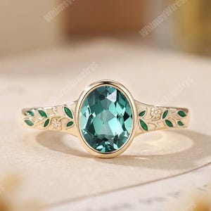Anello di fidanzamento vintage con zaffiro verde ovale incastonato in oro massiccio, con decorazioni smaltate a forma di foglia e fiore ispirate alla natura, per lei, anello Art Déco, regalo di promessa.