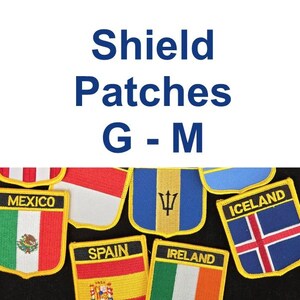 May include: Shield-shaped patches featuring flags of various countries, including Mexico, Spain, Ireland, and Iceland. The patches have a yellow border and are embroidered with national flags. The text "Shield Patches G-M" is displayed in blue.