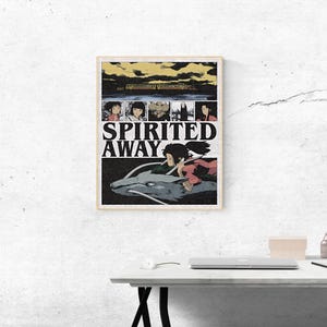 May include: A framed poster featuring the animated film "Spirited Away." The poster has a beige border and displays the film's title in large, bold letters. The artwork includes character illustrations and a scene of a girl riding a dragon.