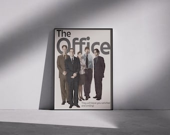 May include: A framed poster featuring the cast of "The Office" television show. The poster has a black frame and displays a group of five people in business attire. The show's title is at the top, with the tagline "They will leave you satisfied and smiling!"