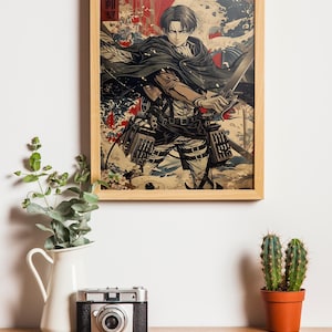 May include: Wooden framed print featuring a character from the anime series Attack on Titan. The artwork depicts a figure with a sword, set against a backdrop of red and white splashes. The print is displayed on a wooden surface.