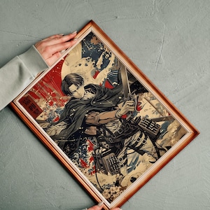 May include: Framed artwork featuring a character from the anime series Attack on Titan. The illustration depicts a person in a black cloak holding a sword, with a dynamic background of red, white, and blue elements. The frame is a warm brown color.