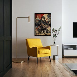 May include: A framed anime art print featuring a character with a sword, set against a backdrop of red and blue hues. The artwork is displayed above a yellow armchair, with a gold floor lamp and a minimalist side table with a vase of flowers.