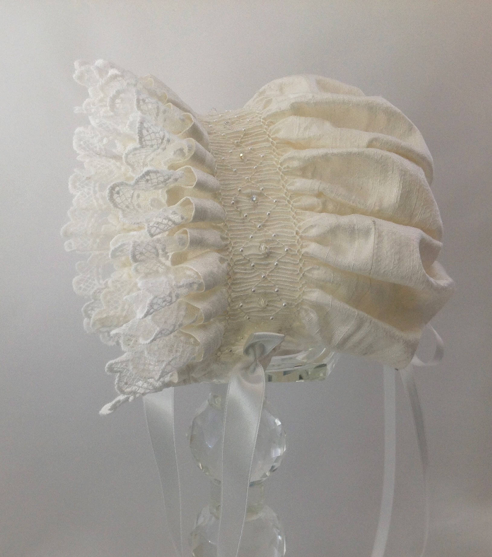 Off White and Blue Hand Smocked Baby Bonnet