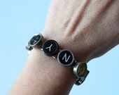 I love NY vintage typewriter key bracelet - with a selection of numbers, letters and symbols free shipping