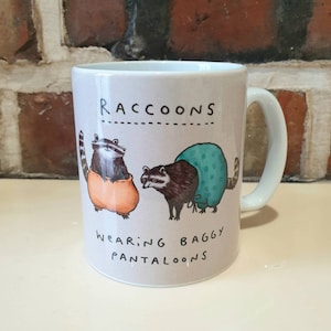 Raccoons Wearing Baggy Pantaloons Mug