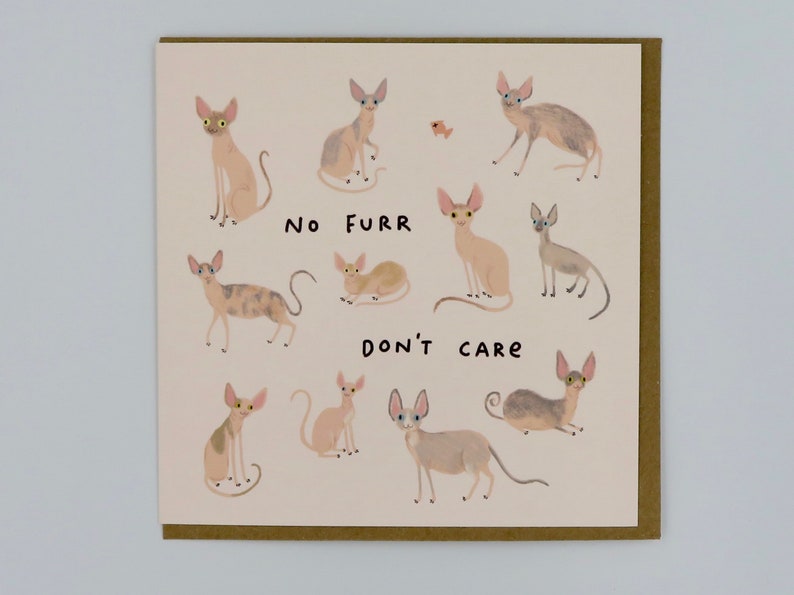 May include: A greeting card with a light pink background featuring a cartoon illustration of hairless cats. The text on the card reads "No Furr Don't Care".