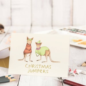 Australische Weihnachtskarte: Kängurus in Pullovern