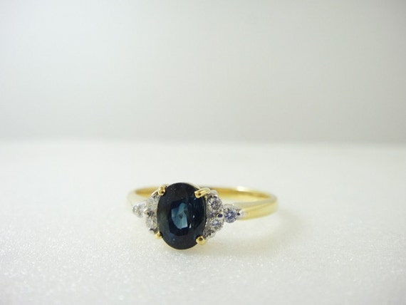 Items similar to Dark Blue Sapphire and Diamond Ring on Etsy