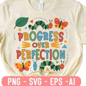 May include: Cream-colored t-shirt featuring the phrase "PROGRESS OVER PERFECTION" in colorful letters. The design includes cartoon caterpillars, butterflies, and geometric shapes. The bottom of the shirt has the text "PNG - SVG - EPS - AI".