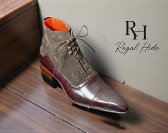 May include: A brown and olive green leather boot with a pointed toe and lace-up closure. The boot features a suede upper and a polished leather toe cap. The brand name "Regal Hide" is visible in the background.