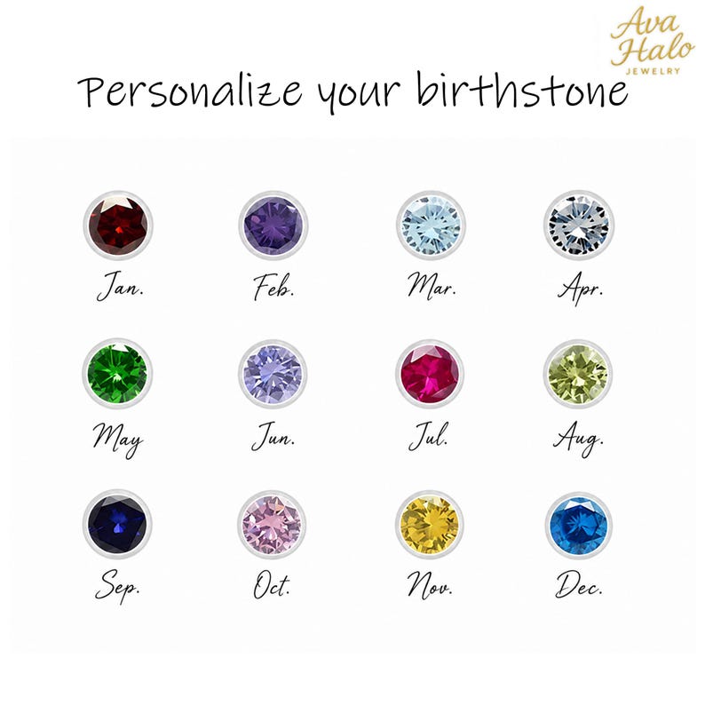 Może przedstawiać: Wykres zatytułowany Personalize your birthstone od Ava Halo Jewelry przedstawiający dwanaście okrągłych kamieni szlachetnych w r&oacute;żnych kolorach, z kt&oacute;rych każdy jest oznaczony skr&oacute;tem miesiąca od Jan. do Dec. Kamienie reprezentują kamienie urodzinowe.
