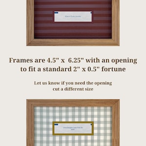 May include: Two rectangular wooden frames with light brown grain. The top frame has a dark red striped background with a fortune cookie slip reading 'When in doubt, mumble.' The bottom frame has a light green gingham background with a fortune slip reading 'Great thoughts come from the heart.' Text states frames are 4.5 inches by 6.25 inches with a 2 inch by 0.5 inch opening.