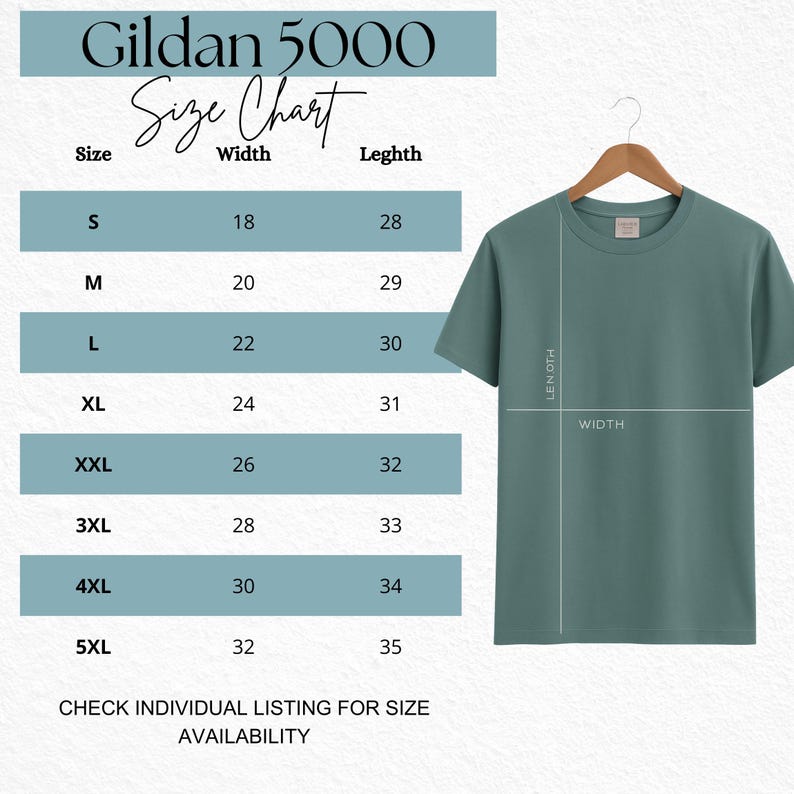 May include: A Gildan 5000 size chart for a solid sage green t-shirt hanging on a wooden hanger. The chart lists sizes S through 5XL with corresponding width and length measurements in inches, alongside a visual diagram indicating how to measure.