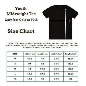 May include: A black short-sleeve t-shirt displayed with a size chart for Youth Midweight Tee Comfort Colors 9018. The chart lists measurements in inches and centimeters for sizes XS through XL, including width and length dimensions.