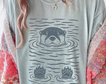 Minimalist Pastel Otter Tee – Hand Drawn Animal Graphic Shirt, Soft Ink Print for Nature & Animal Lovers, Eco Friendly Otter Art