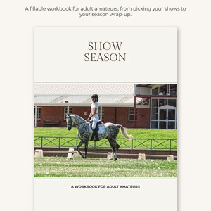 Puede incluir: Un libro de ejercicios blanco titulado Show Season con una fotografía de un jinete sobre un caballo tordo en una pista. El texto dice Show Season y A workbook for adult amateurs. La portada tiene un diseño limpio con texto marrón.