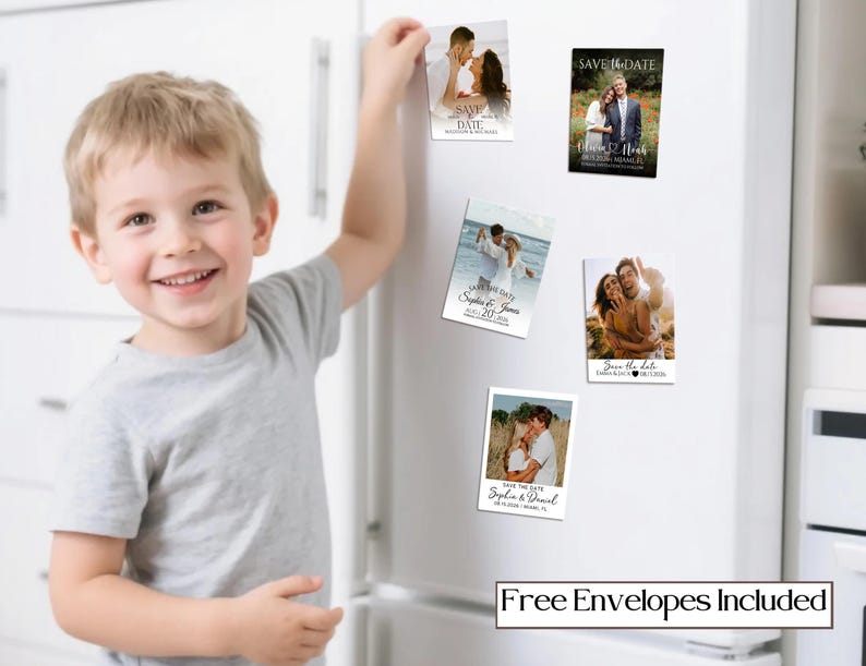 May include: A young child smiles while placing a magnet on a white refrigerator. The magnets are rectangular and feature photos of couples, with text that reads "Save the Date" and names and dates. The bottom of the refrigerator has a text box that reads "Free Envelopes Included."