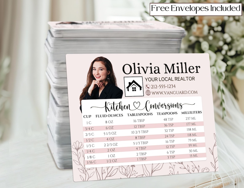May include: A stack of light pink business cards featuring a realtor's name, photo, and contact information. The card includes a kitchen conversion chart with measurements in fluid ounces, tablespoons, teaspoons, and milliliters. The words "Free Envelopes Included" are at the top.