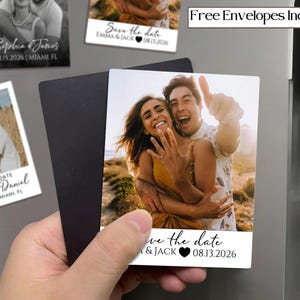 May include: Save the date magnets featuring a smiling couple. The magnets have a photo of the couple and the text "Save the date" with the names and date. The image also includes the text "Free Envelopes Included".