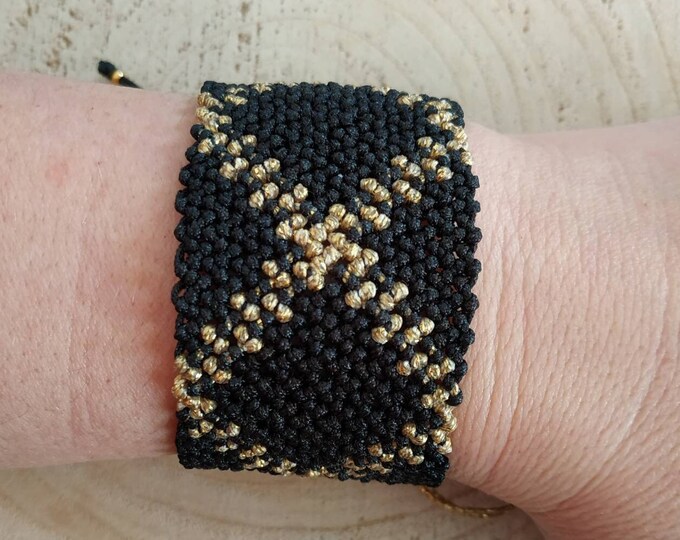 XO XO black knotted wide cuff bracelet