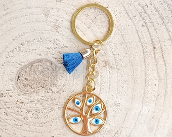 Golden tree of life keychain with evil eyes