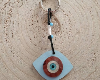 Wooden oval evil eye key ring