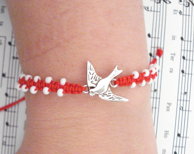Red cord braided bracelet with silver bird