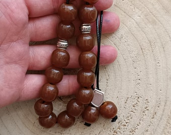 Brown worry beads