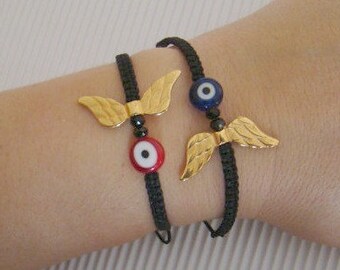 Gold wings with mati bead woven bracelet